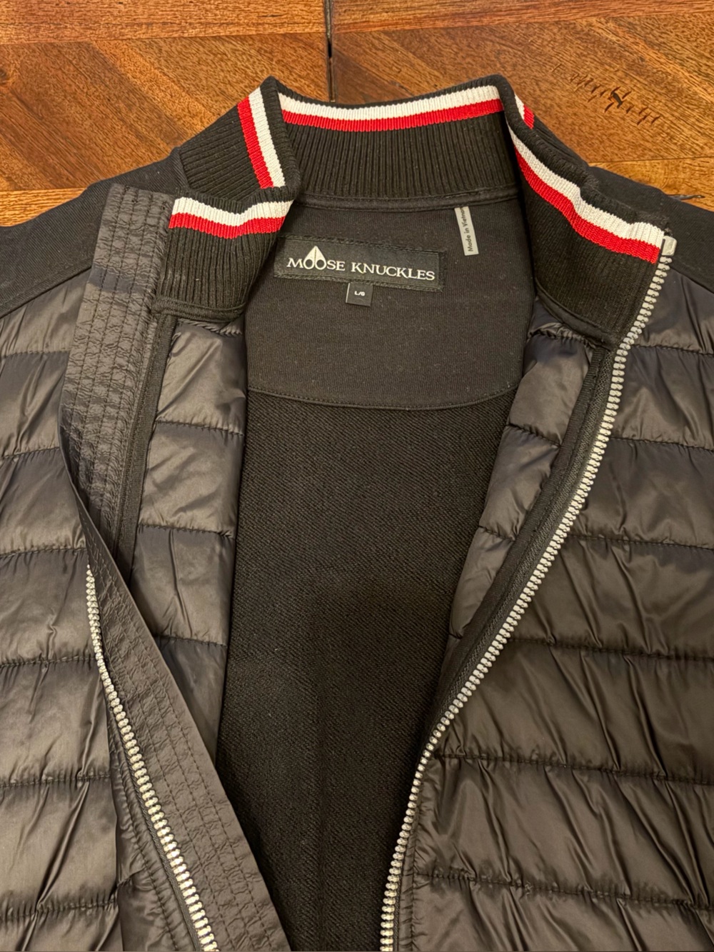 Moose Knuckles Black Quilted Bomber Jacket with Red & White Stripe Collar